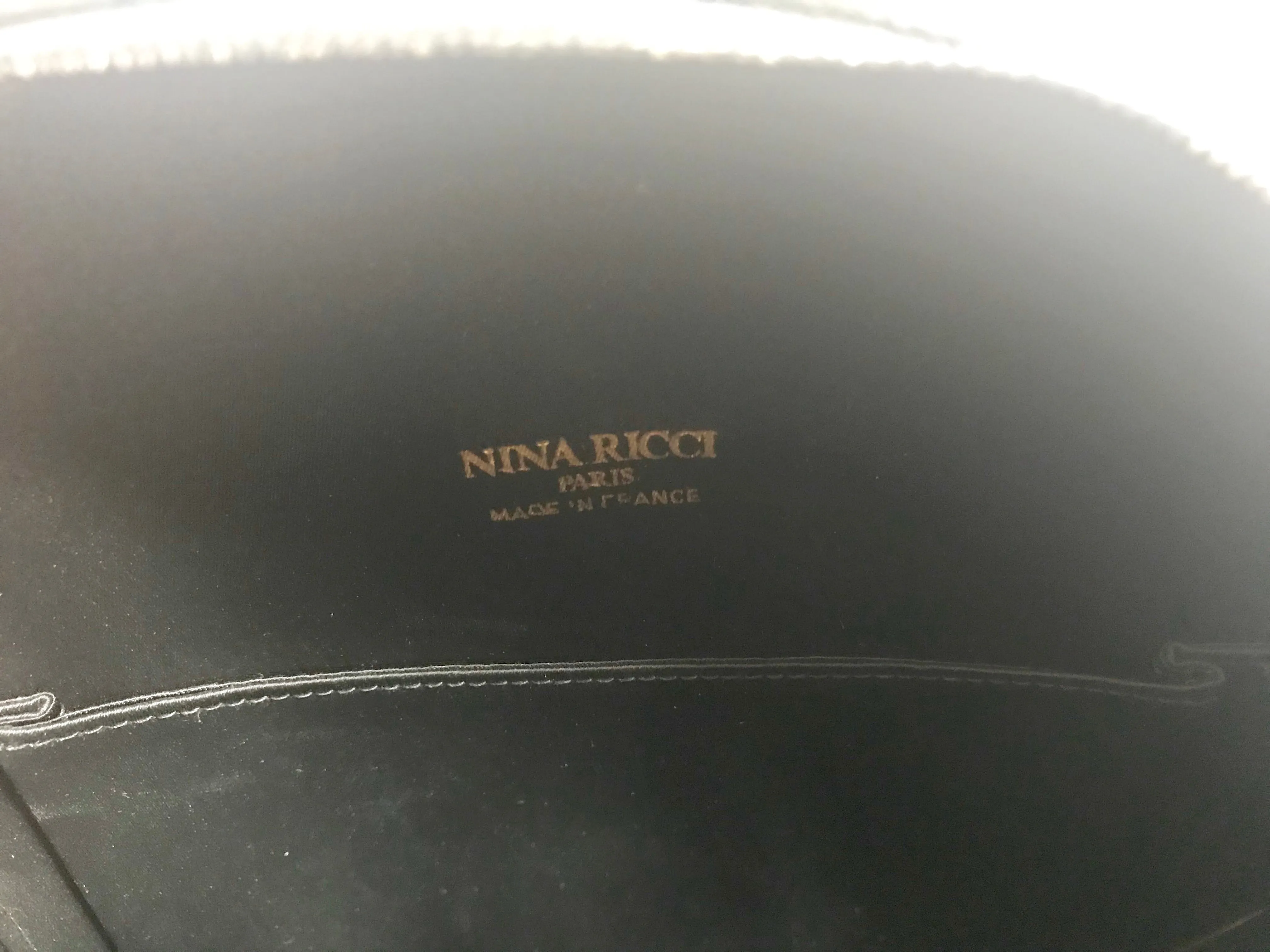 Vintage Nina Ricci black suede and green satin mix round shoulder bag with fringes and enamel star motif. Suzy Wong design. Collectible bag. 060616r3