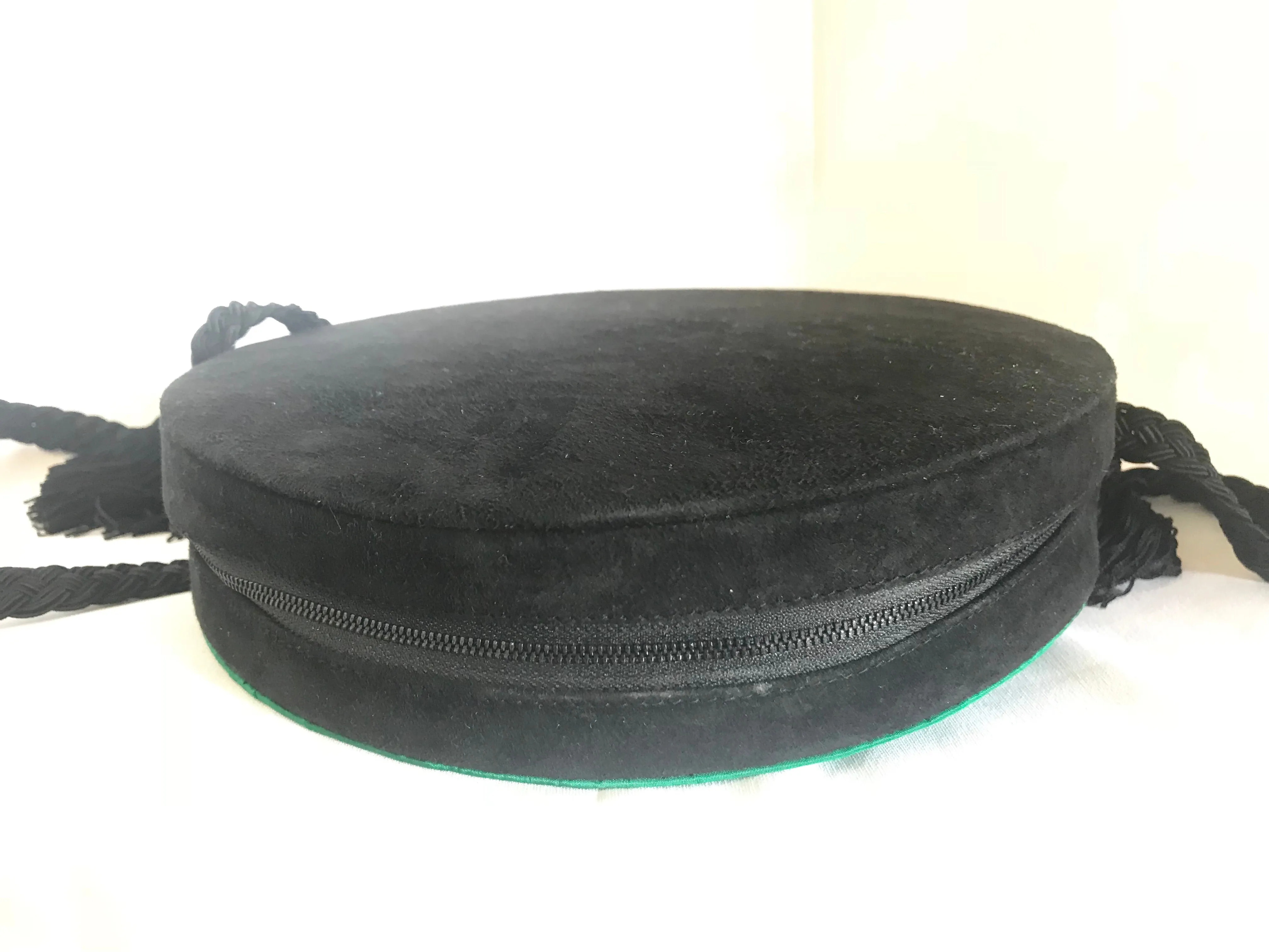 Vintage Nina Ricci black suede and green satin mix round shoulder bag with fringes and enamel star motif. Suzy Wong design. Collectible bag. 060616r3