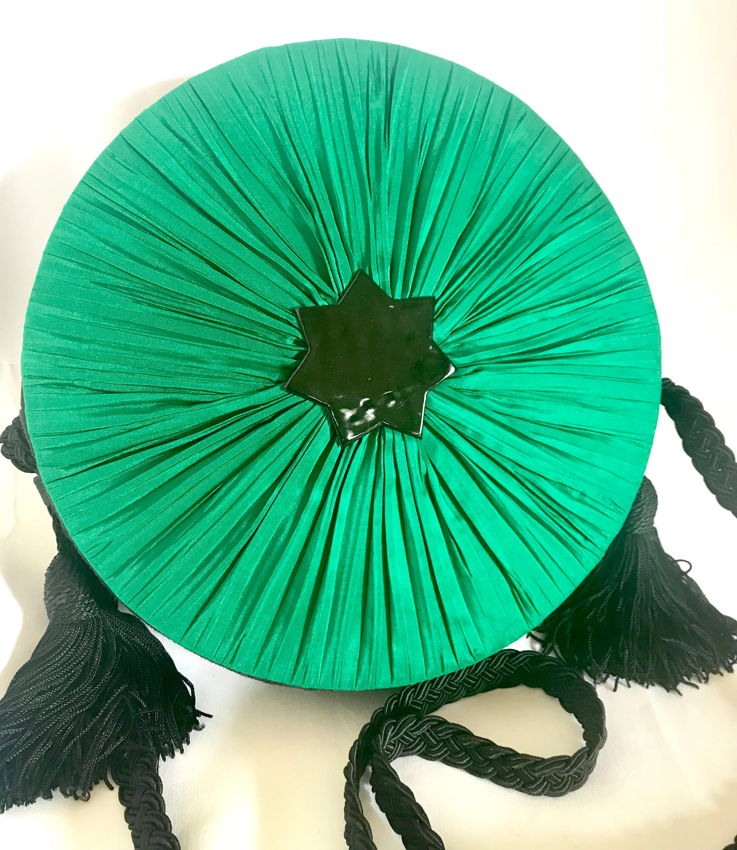 Vintage Nina Ricci black suede and green satin mix round shoulder bag with fringes and enamel star motif. Suzy Wong design. Collectible bag. 060616r3